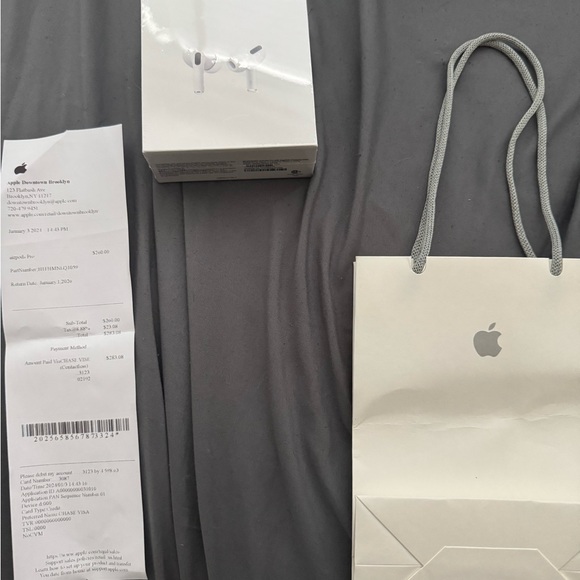 Apple AirPods Pro with White Shopping Bag
